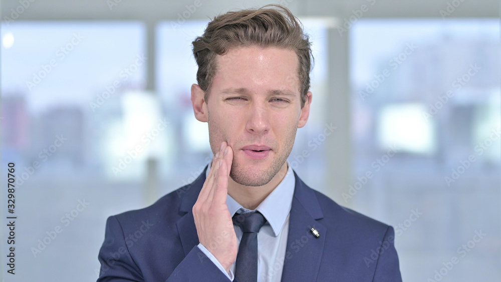 Portrait of Sick Young Businessman having Toothache Portrait of Sick Young Businessman having Toothache