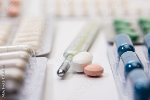 Fototapeta Naklejka Na Ścianę i Meble -  prescription drugs scattered on the table