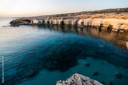 Blue lagoon in the Mediterranean on sunset, Cyprus cave