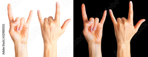 Set of women's hands showing rock n roll sign or giving the devil horns gesture photo