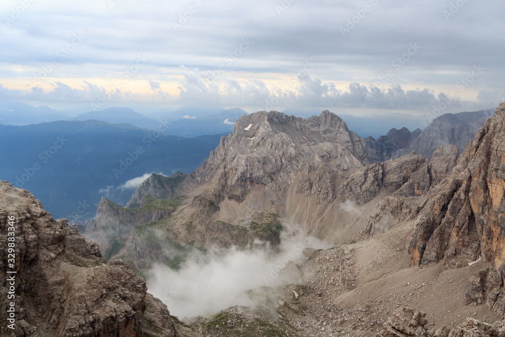 Mountain alps panorama in Brenta Dolomites with clouds, Italy