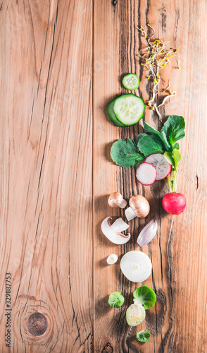 Various vegetables on wooden desk top-down. Flat lay above view.