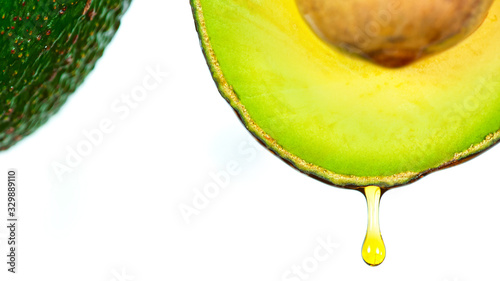Fresh cut avocado with oil ...