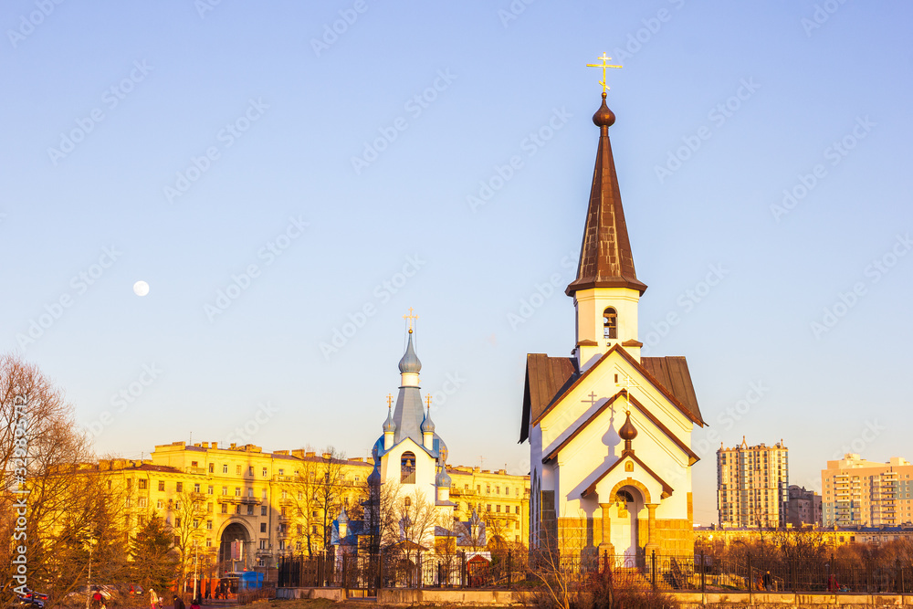 small Church in the city at sunset landmark small Church in the city at sunset landmark