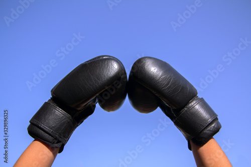 boxing gloves in the sky © Andrea