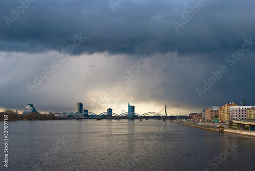 view of the city of Riga from the island bridge © fotofotofoto