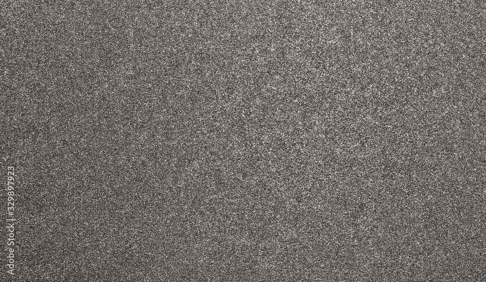 Fototapeta premium Granular abstract uniform grainy surface. Rough texture background.