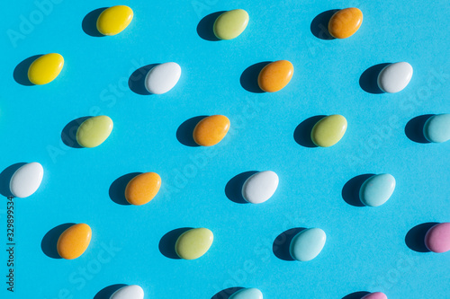 colorful candies on blue background