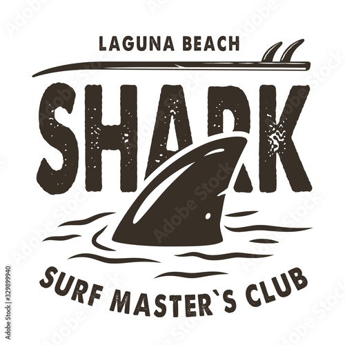Shark fin in the water with waves