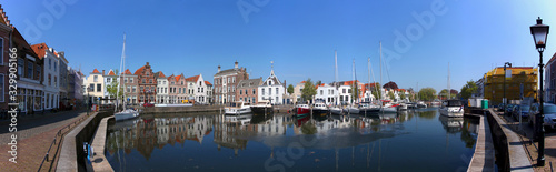 Slika na platnu Panoramic view of the historical harbor in the old town of Goes / Netherlands wi