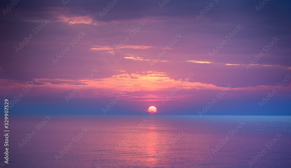 beautiful sunset over the sea in summer time