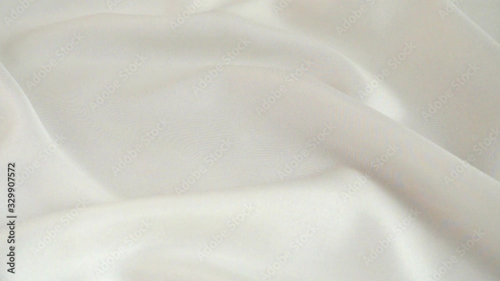 Pearls fall on silk. Slow motion. Pearls fall on silk. Slow motion.