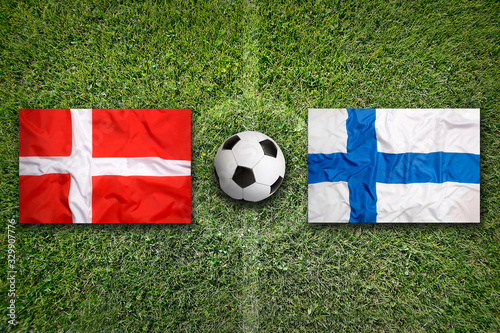Denmark vs. Finland flags on soccer field