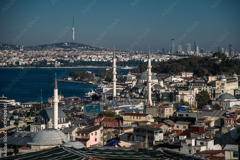  Bosphorus in Istanbul at sunset, Turkey. Aerial panoramic view of the city divided by Bosphorus. Beautiful cityscape of Istanbul with cruise ships on the nice Bosphorus. 