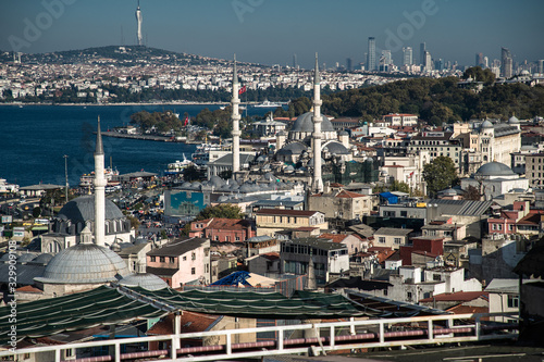  Bosphorus in Istanbul at sunset, Turkey. Aerial panoramic view of the city divided by Bosphorus. Beautiful cityscape of Istanbul with cruise ships on the nice Bosphorus. 