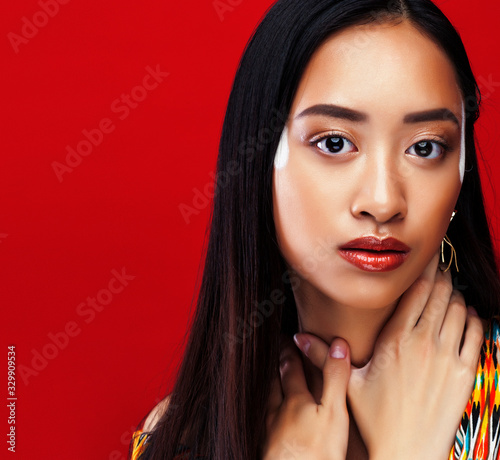 beauty young asian girl with fashion make up on red background   beauty stylish look