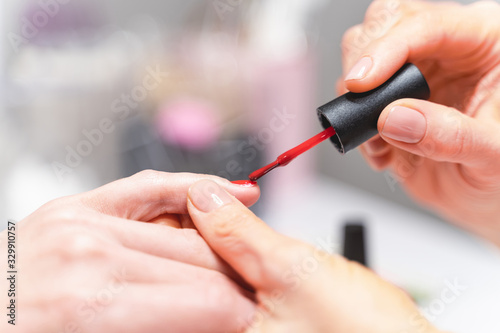 Focused photo on master that doing manicure