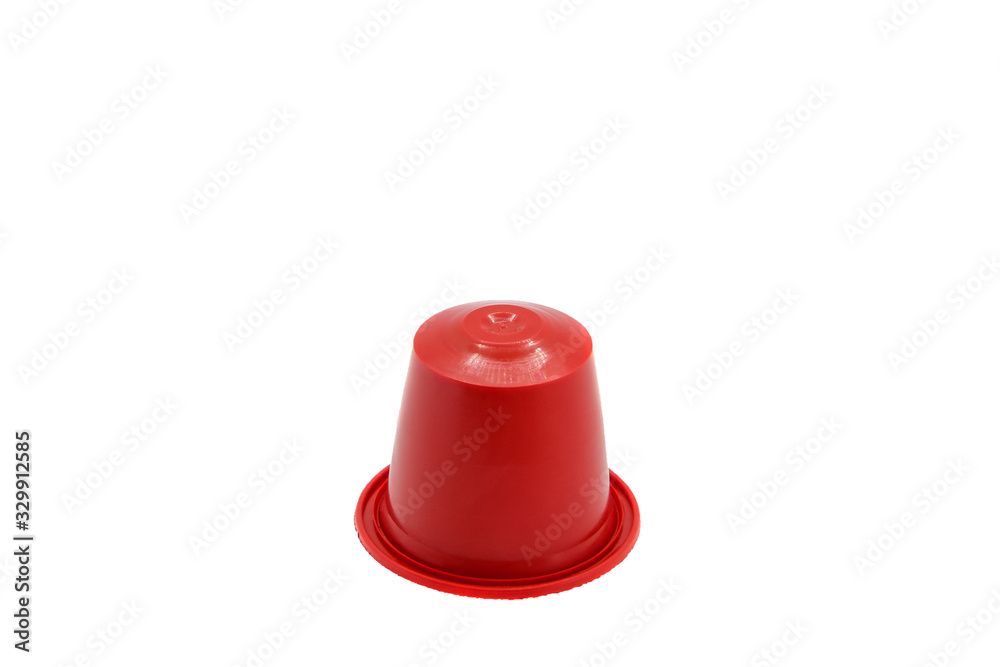 Red Coffee Capsule for compatible systems, espresso coffee, on white background. Red Coffee Capsule for compatible systems, espresso coffee, on white background.