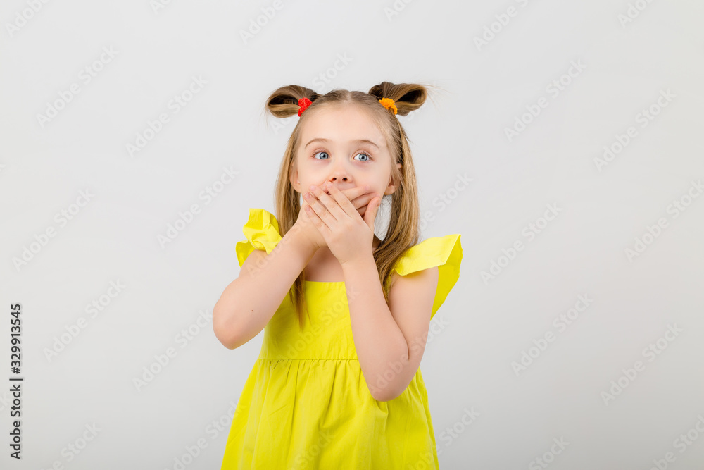Portrait of a beautiful and confident girl showing thumbs up isolated one white Portrait of a beautiful and confident girl showing thumbs up isolated one white