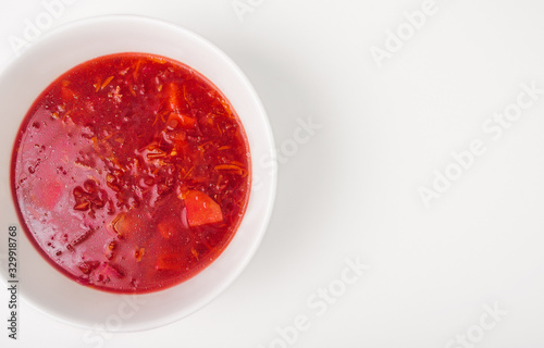 Cold tasty beet soup isolated on white background