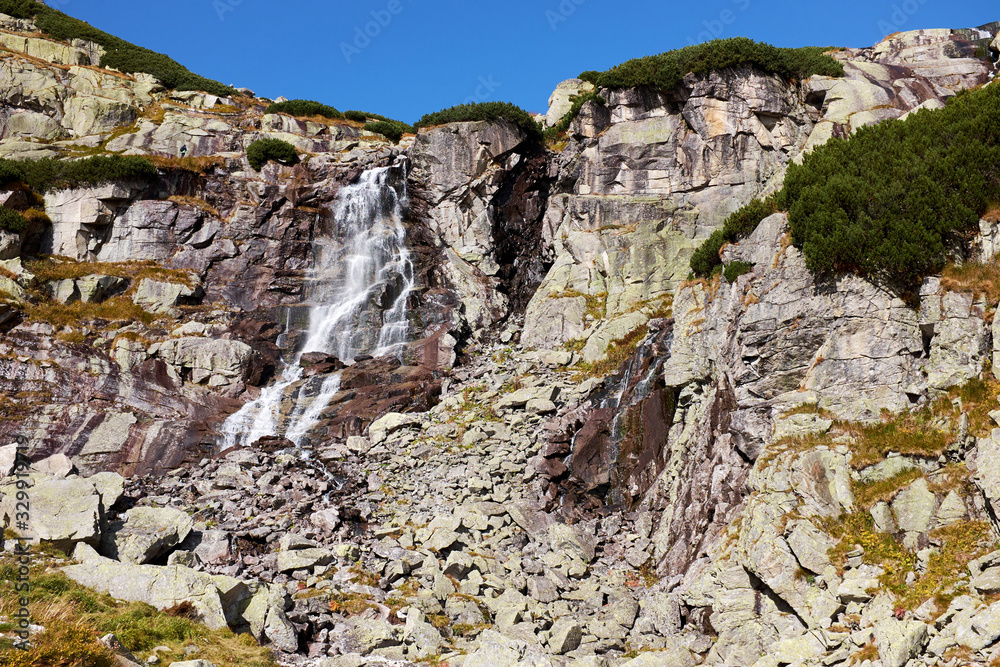 Mountain waterfall Skok, a tourist attraction near to Strbske Pleso in High Tatras National Park, Slovakia