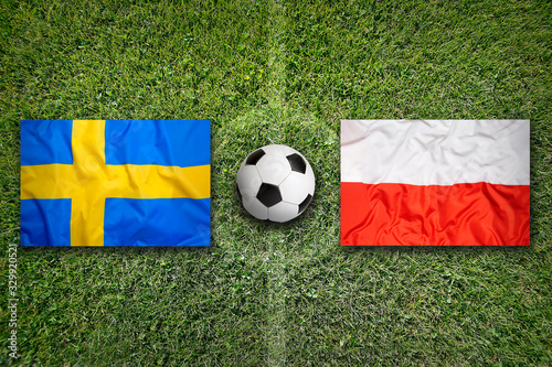 Sweden vs. Poland flags on soccer field