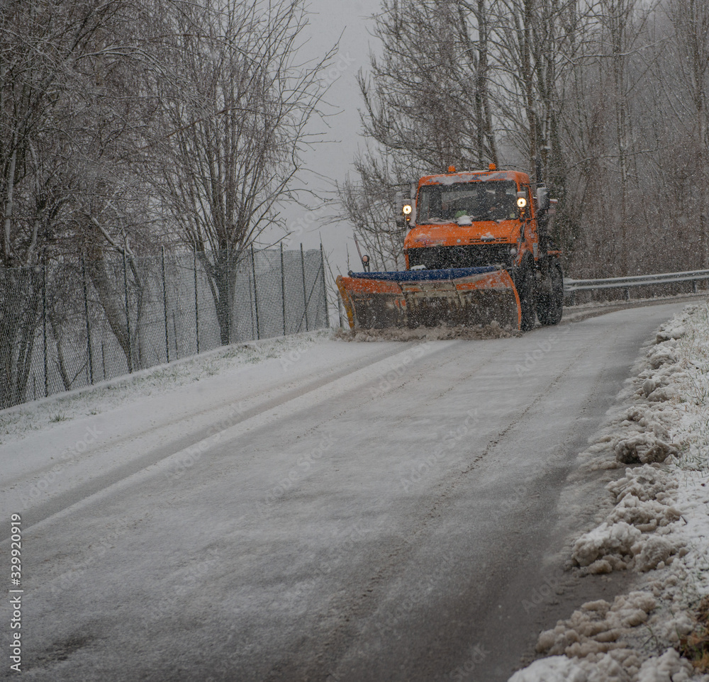 Snowplow as it clears the road Snowplow as it clears the road