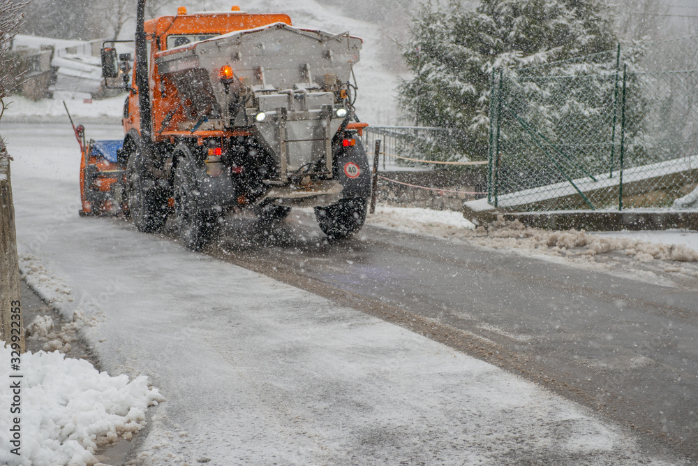 Snowplow as it clears the road Snowplow as it clears the road