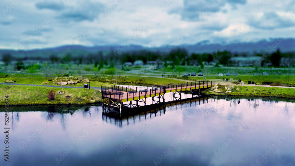 Dock Reflection in Pond with Darkened Background