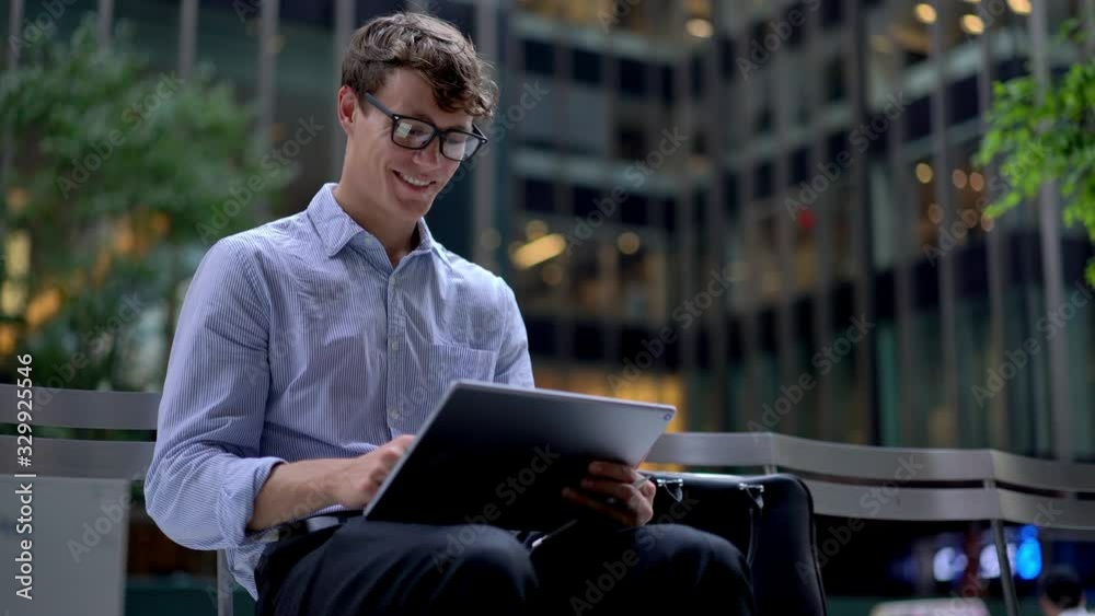 Successful trader in glasses checking money transfer information on financial website connected to 4g internet on modern digital tablet, intelligent man in classic spectacles chatting with investors Successful trader in glasses checking money transfer information on financial website connected to 4g internet on modern digital tablet, intelligent man in classic spectacles chatting with investors