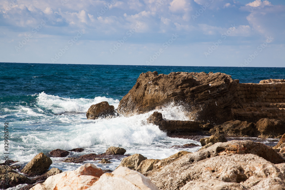 Mediterranean Sea crashing on the Rocky Shore of Caesarea Israel