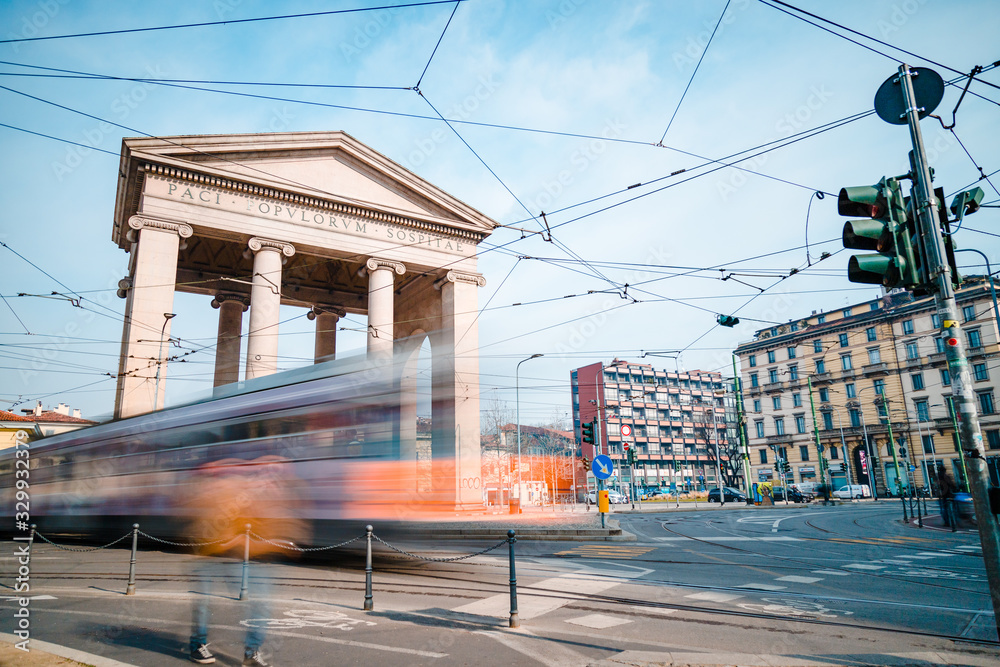 Obraz premium Milan / Italy - March 2020: Milan, Porta Ticinese, Tram with motion blur, long exposure