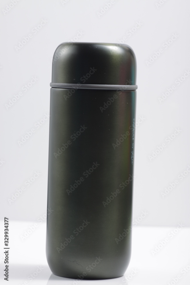 metallic black insulated tumbler on a white isolated background metallic black insulated tumbler on a white isolated background