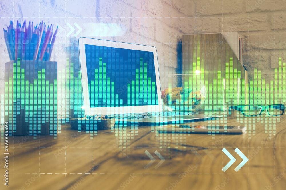Multi exposure of chart and financial info and work space with computer background. Concept of international online trading. Multi exposure of chart and financial info and work space with computer background. Concept of international online trading.