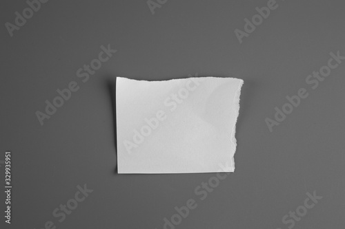 Blank portrait mock-up crumpled paper. brochure magazine isolated on gray background, changeable background / white paper isolated. © ooddysmile