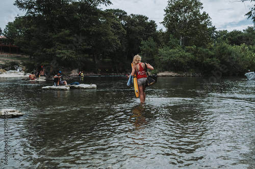 Fototapeta Naklejka Na Ścianę i Meble -  Woman in River