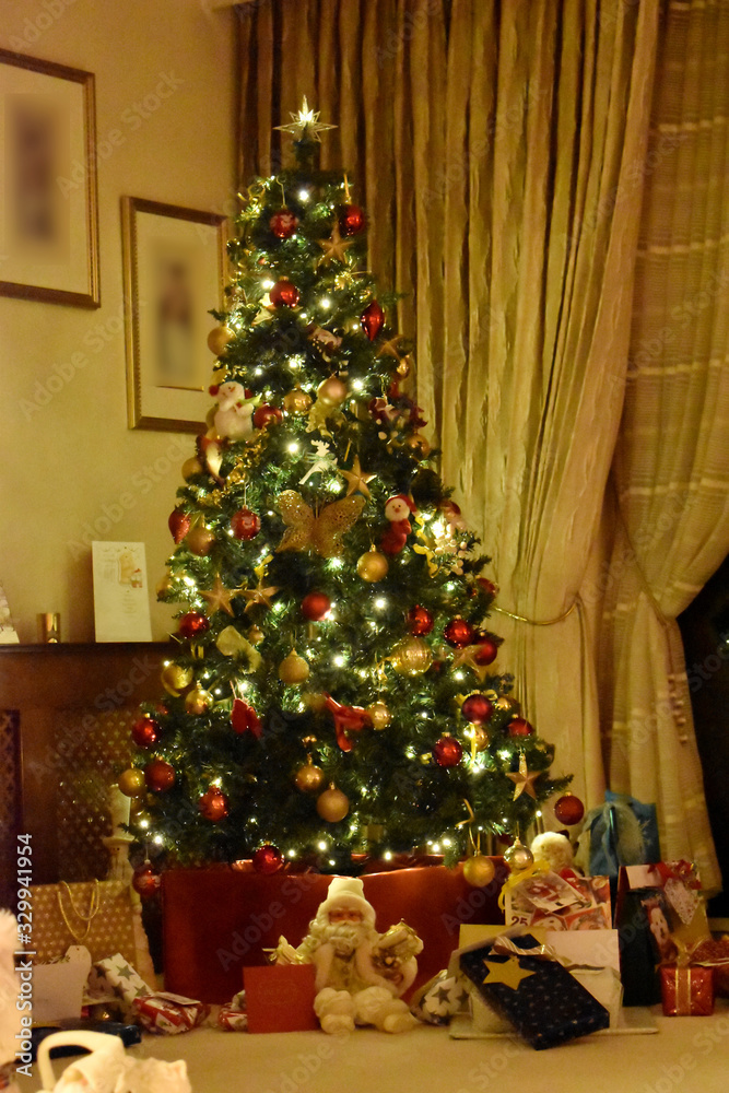 Christmas tree and gift boxes in living room, decoration on Christmas holiday