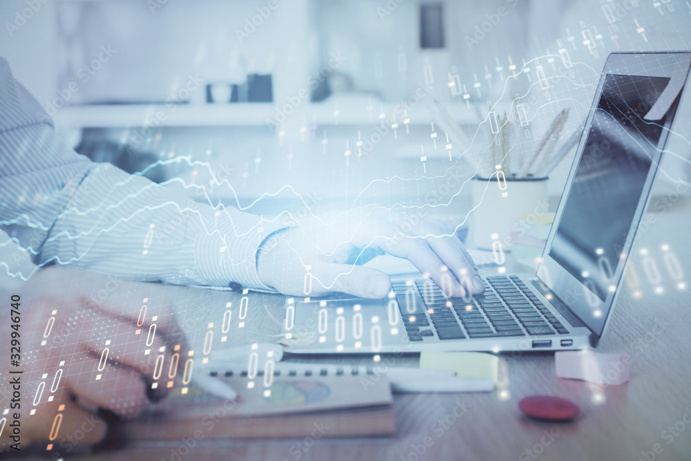 Multi exposure of stock market chart with man working on computer on background. Concept of financial analysis.