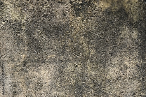 фотографія Dirty concrete wall texture soiled with coarse soot deposits on the surface hori
