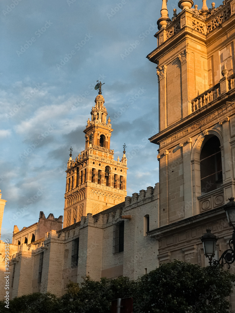 Seville Cathedral reflected by the sunset. Gothic cathedral of Seville, the second largest cathedral in the world.