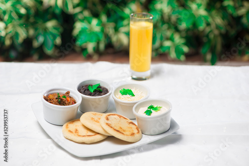 Desayuno venezolano arepas de maiz blanco harina pan  photo