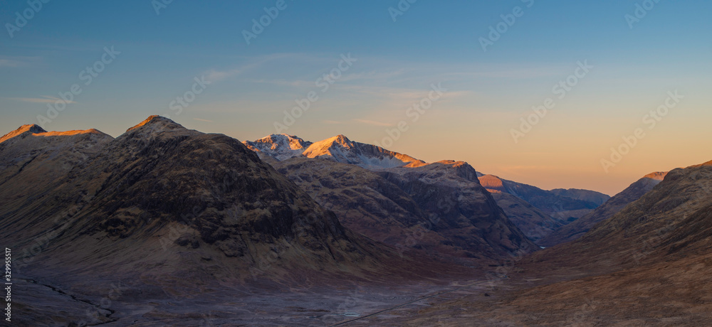 panoramic view of glencoe mountains and valley, highlands, scotland, uk.