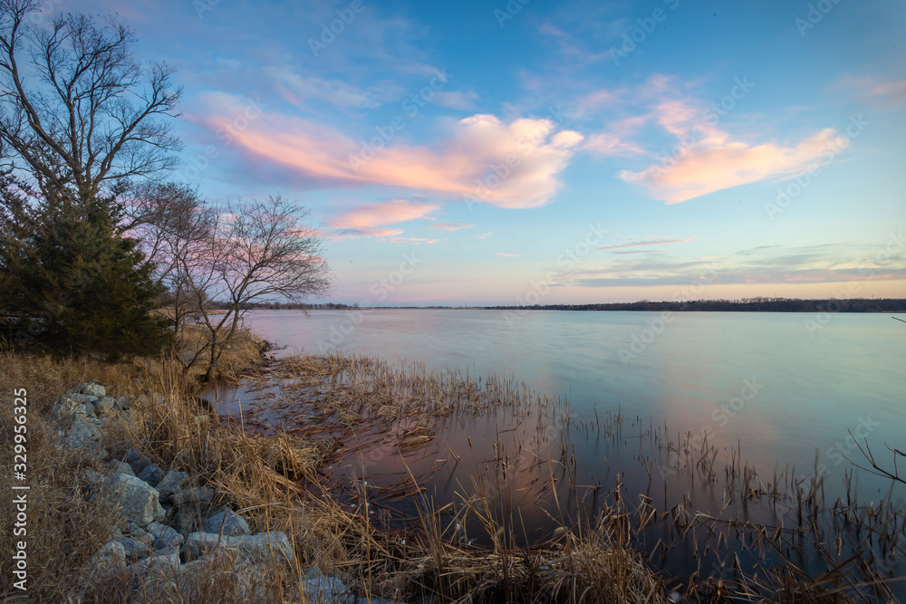 long exposure sunset over lake in nebraska long exposure sunset over lake in nebraska