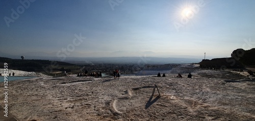 white lime cascades formed by hot mineral springs at Pamukkale, Turkey