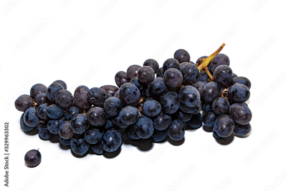 Bunches of dark grapes isolated on white background Bunches of dark grapes isolated on white background