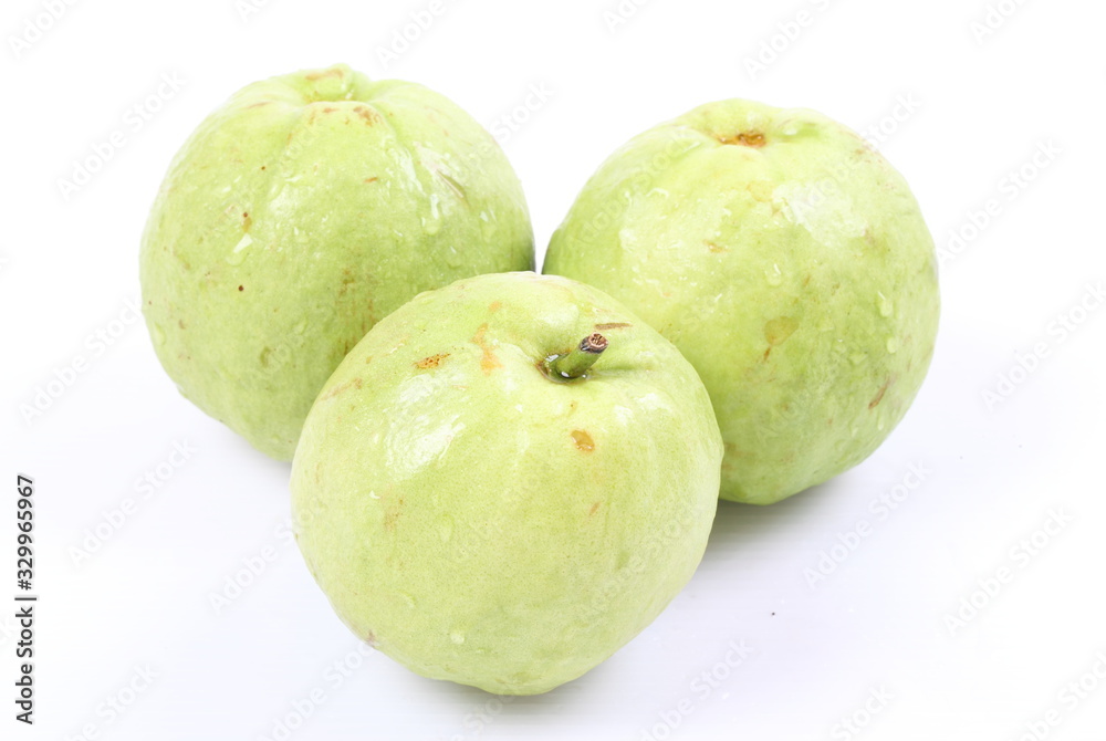 Guava (tropical fruit) on white background Guava (tropical fruit) on white background