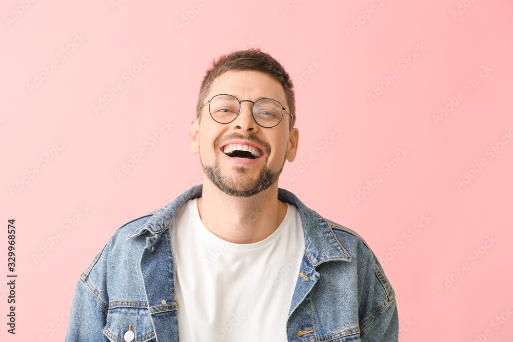 Handsome man with glasses on color background Handsome man with glasses on color background