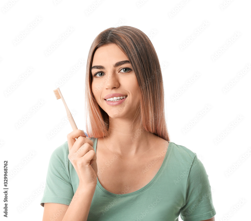 Beautiful young woman with toothbrush on white background Beautiful young woman with toothbrush on white background