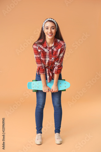 Stylish young woman with sk...