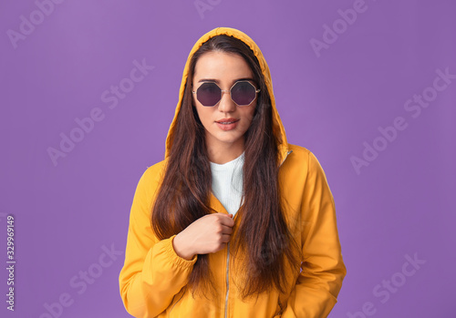 Stylish young woman on colo...